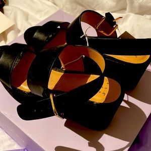 Size 8  black wedge sandals. New